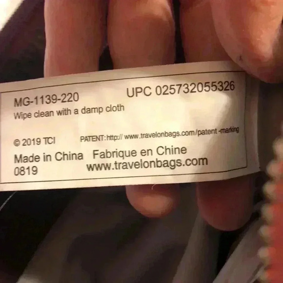 Magellan’s purple nylon shoulder bag. - Picture 12 of 12